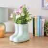 Artificial Floral Arrangement In Ceramic Wellington Boot